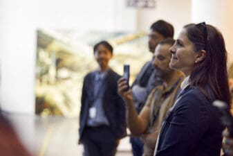 Group of business people listening to a presentation