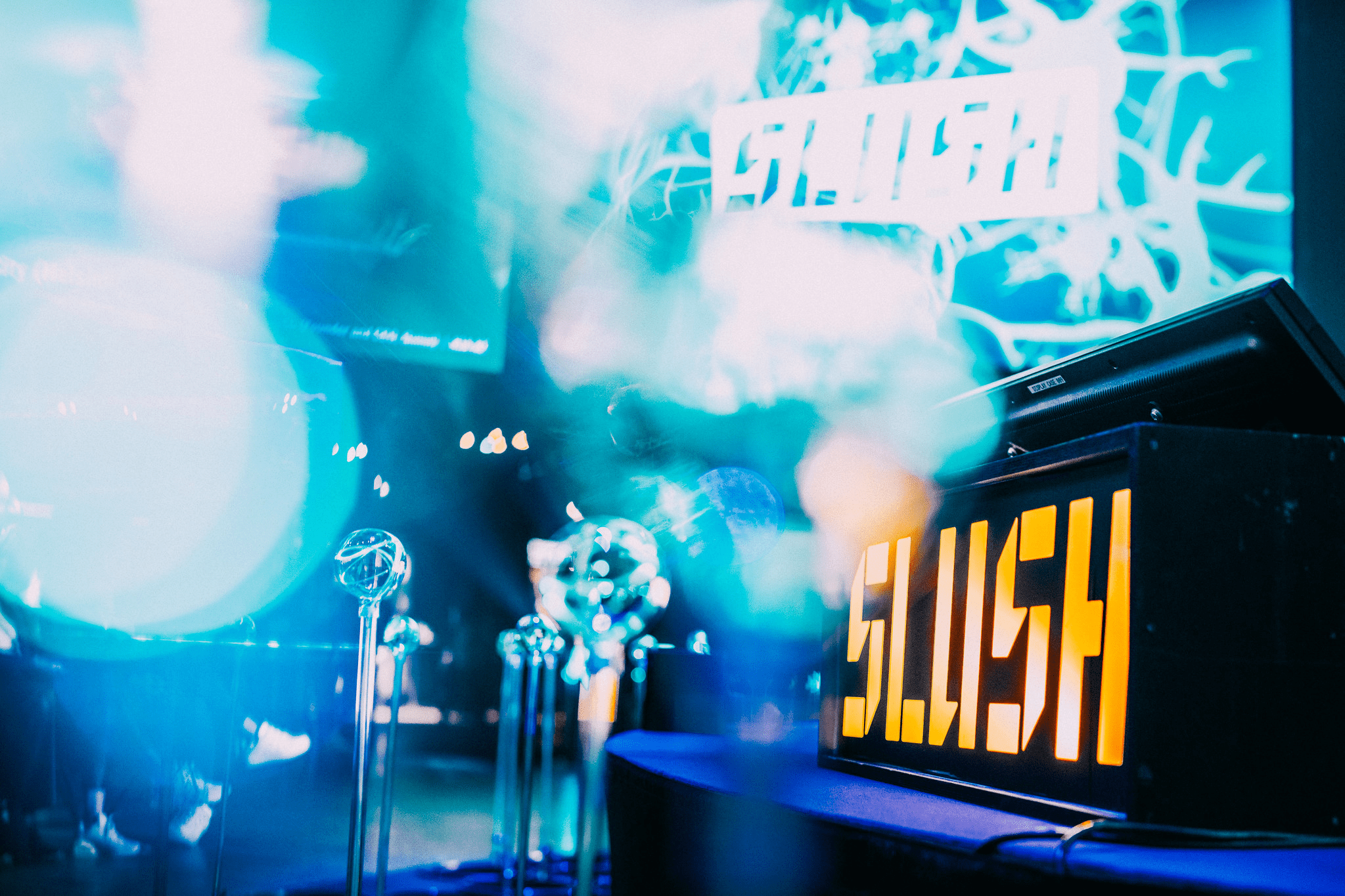 Slush stage with a large screen and a microphone for keynote or panel